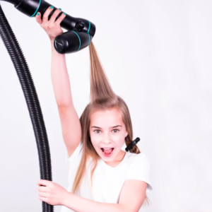 The RevAir Reverse-Air Dryer inhales your wet hair and coughs it up dry