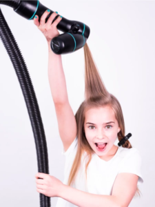 The RevAir Reverse-Air Dryer inhales your wet hair and coughs it up dry