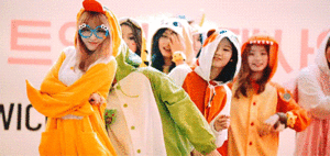 Dance crew wearing animal onesies