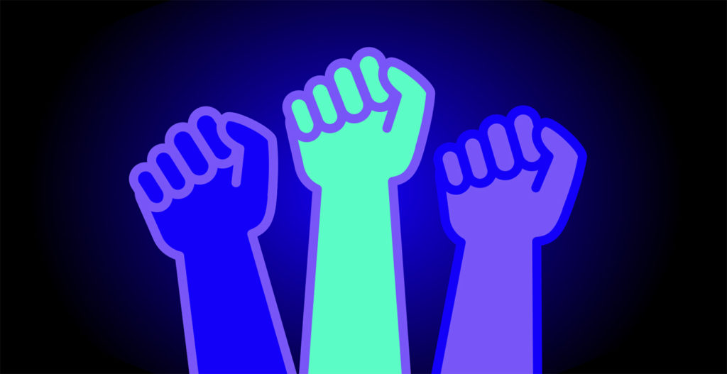 3 fists of different colours raised in solidarity
